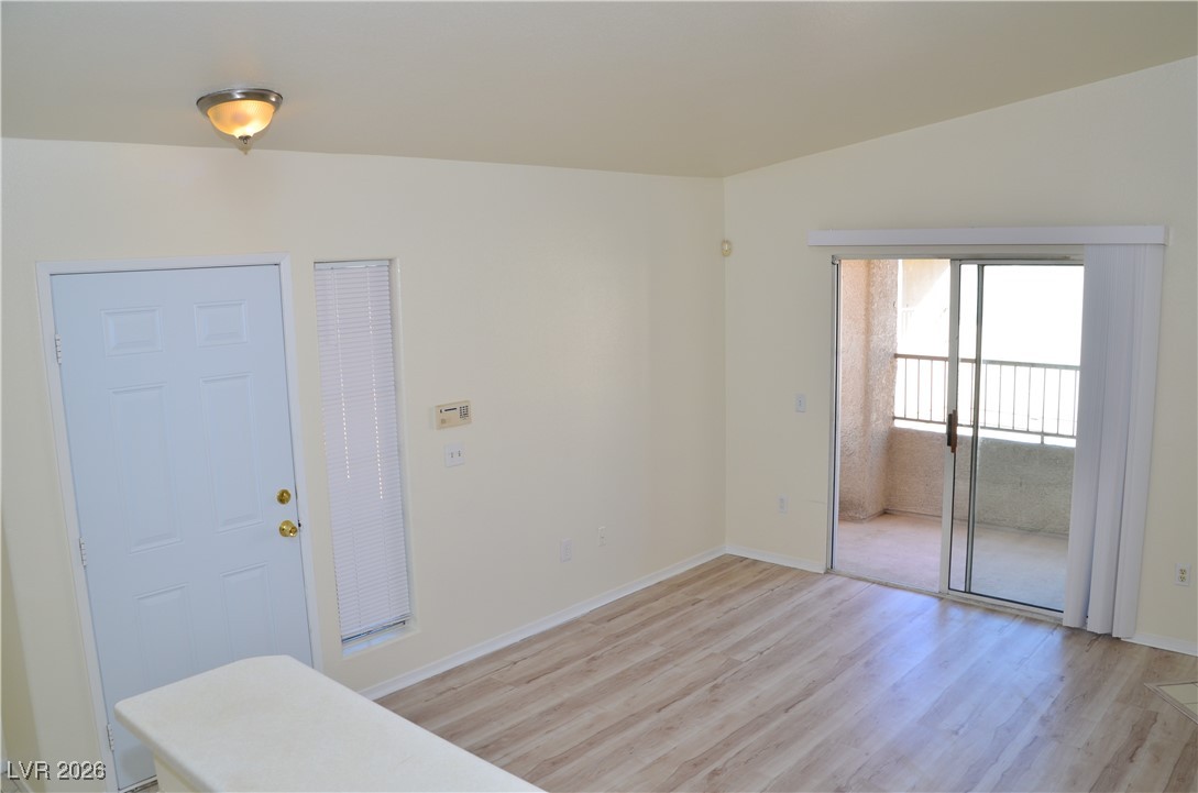 1881 West Alexander Road, Unit 2101 North Las Vegas, NV 89032 - Photo 10 of 37 Foyer featuring light wood-style floors and baseboards