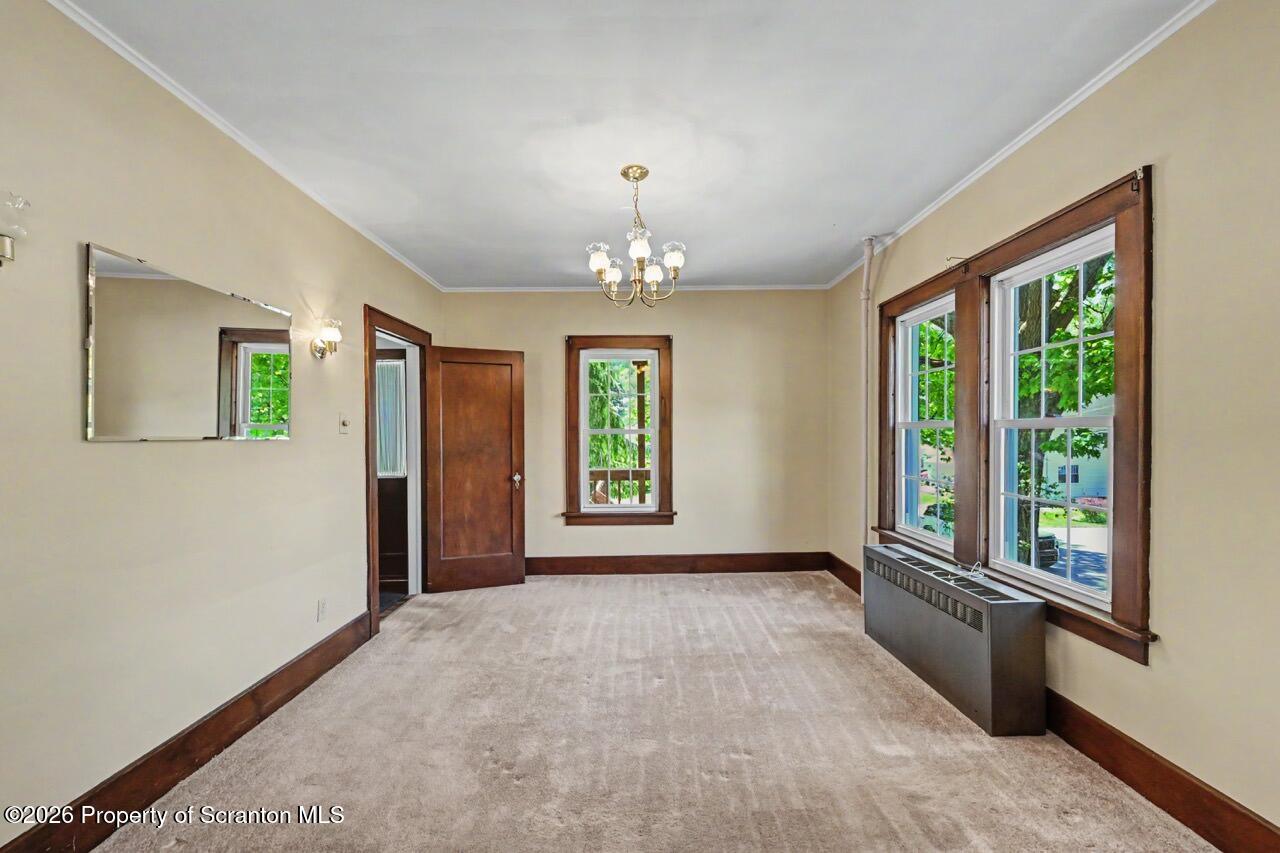 502 Layton Road Clarks Summit, PA 18411 - Photo 15 of 42 a view of an empty room with a window