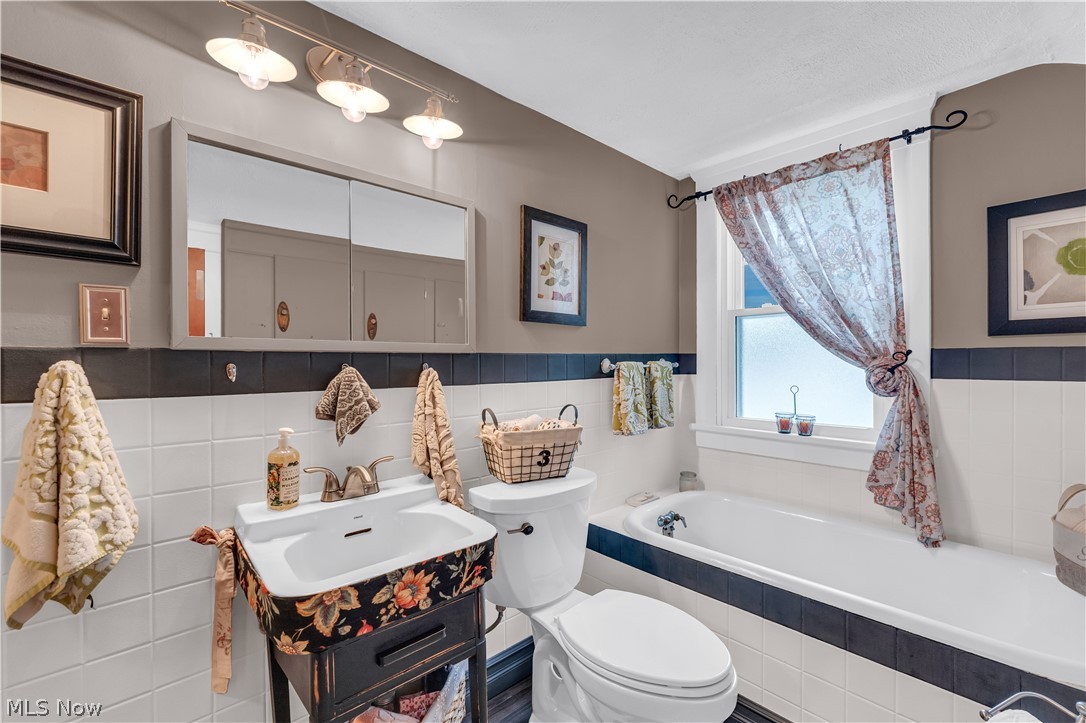 1563 Commodore Road Lyndhurst, OH 44124 - Photo 21 of 37 Full 2nd Floor Bath is stunning with bathtub and shower combo
