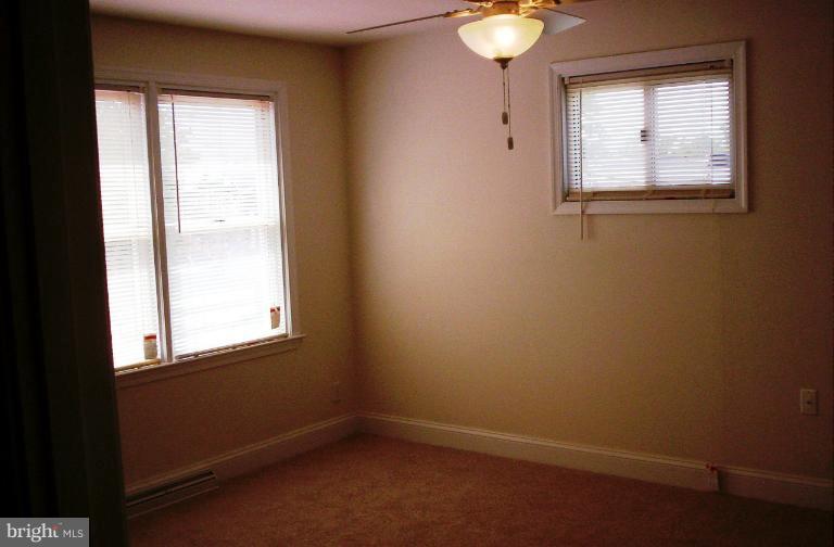 5501 Whitby Road Baltimore, MD 21206 - Photo 14 of 21 an empty room with a window
