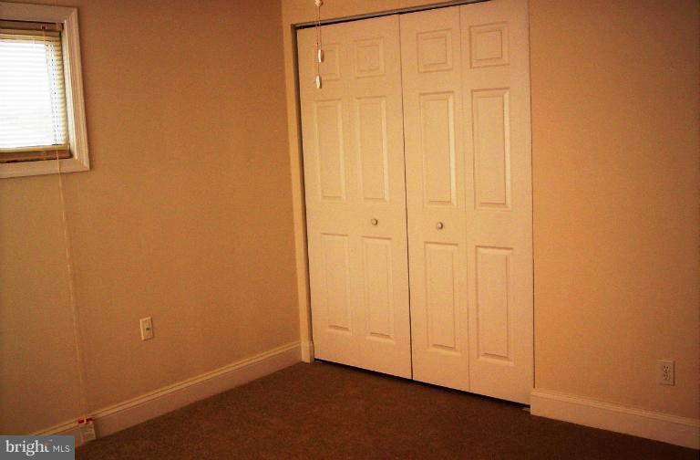 5501 Whitby Road Baltimore, MD 21206 - Photo 19 of 21 an empty room with windows