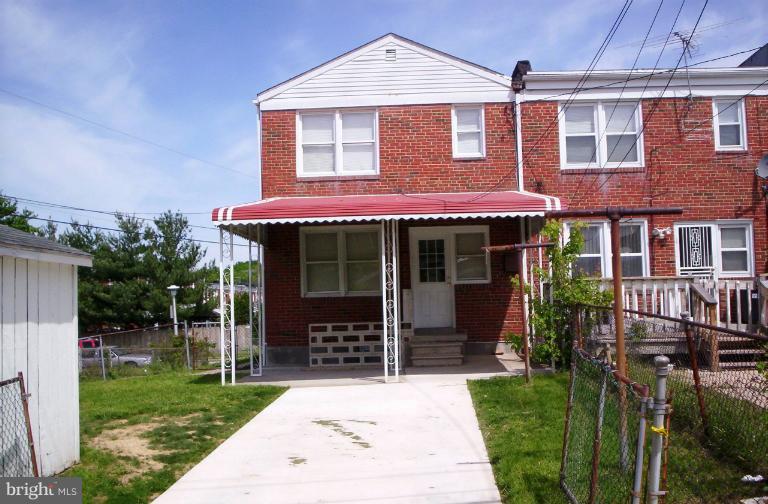 5501 Whitby Road Baltimore, MD 21206 - Photo 10 of 21 a front view of a house with porch
