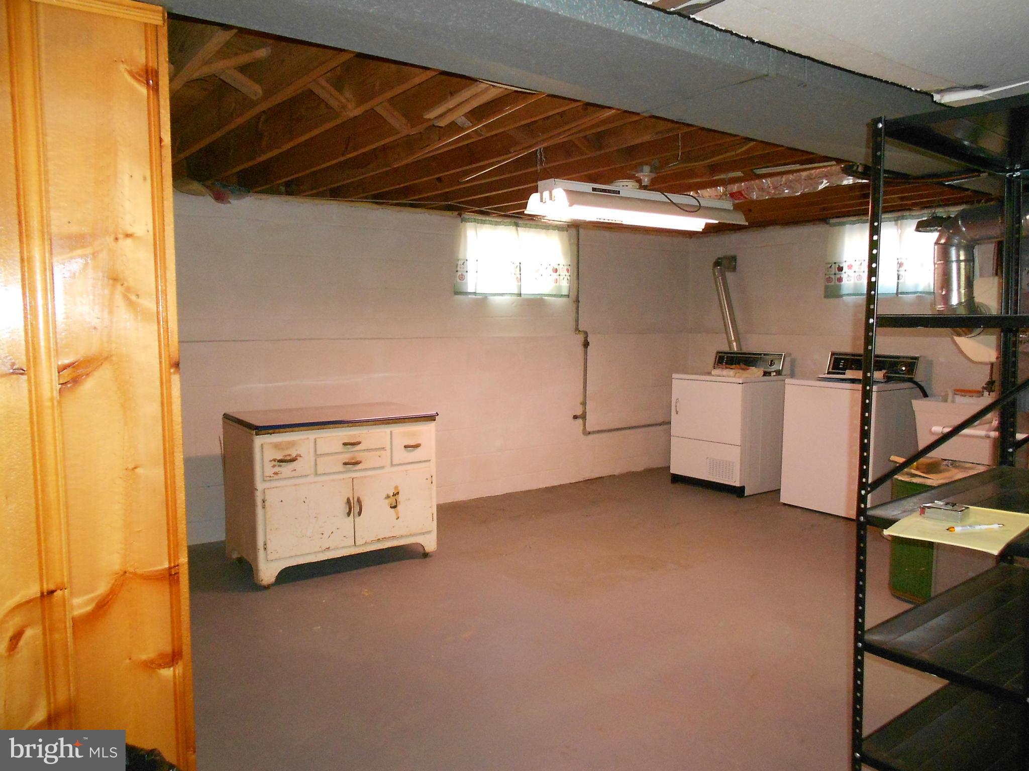 7704 Seekford Road Baltimore, MD 21219 - Photo 12 of 23 Large laundry area