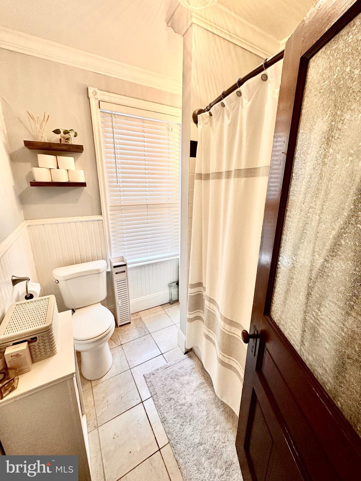 4531 Wilde Street Philadelphia, PA 19127 - Photo 19 of 23 a bathroom with a toilet a sink and a shower