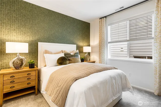 a bedroom with a bed and closet