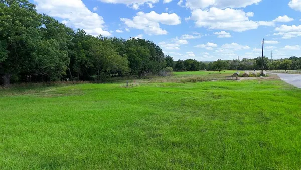 a view of a golf course with a lake