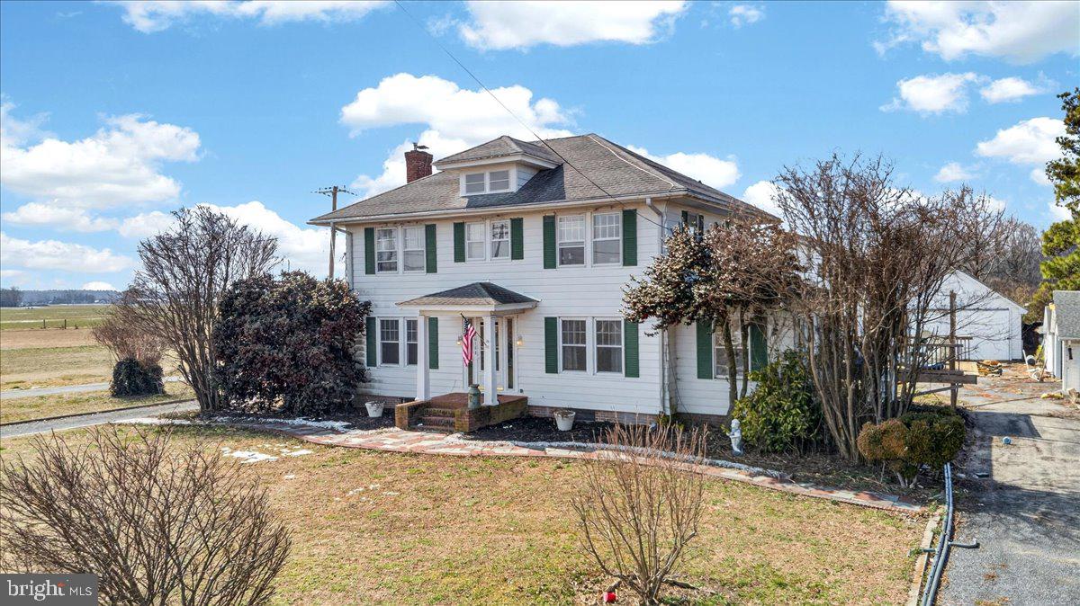 32076 Gordy Road Laurel, DE 19956 - Photo 3 of 26 a front view of a house with a yard