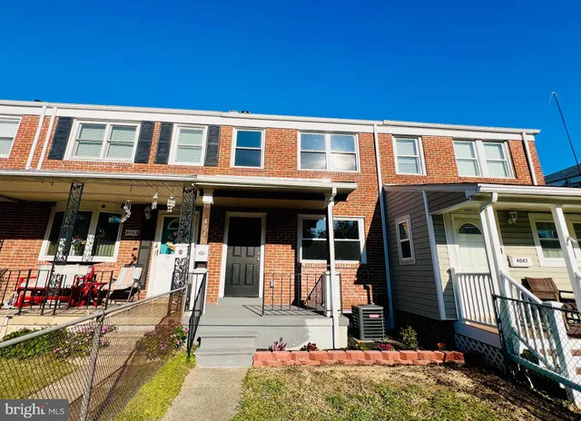 a front view of a house with a patio