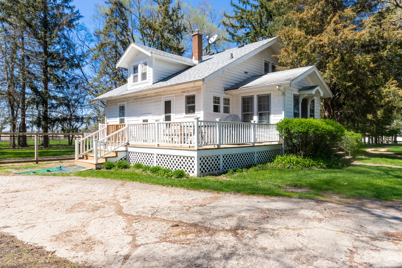 42W671 Jericho Road Sugar Grove, IL 60554 - Photo 1 of 31 a front view of a house with a garden and plants
