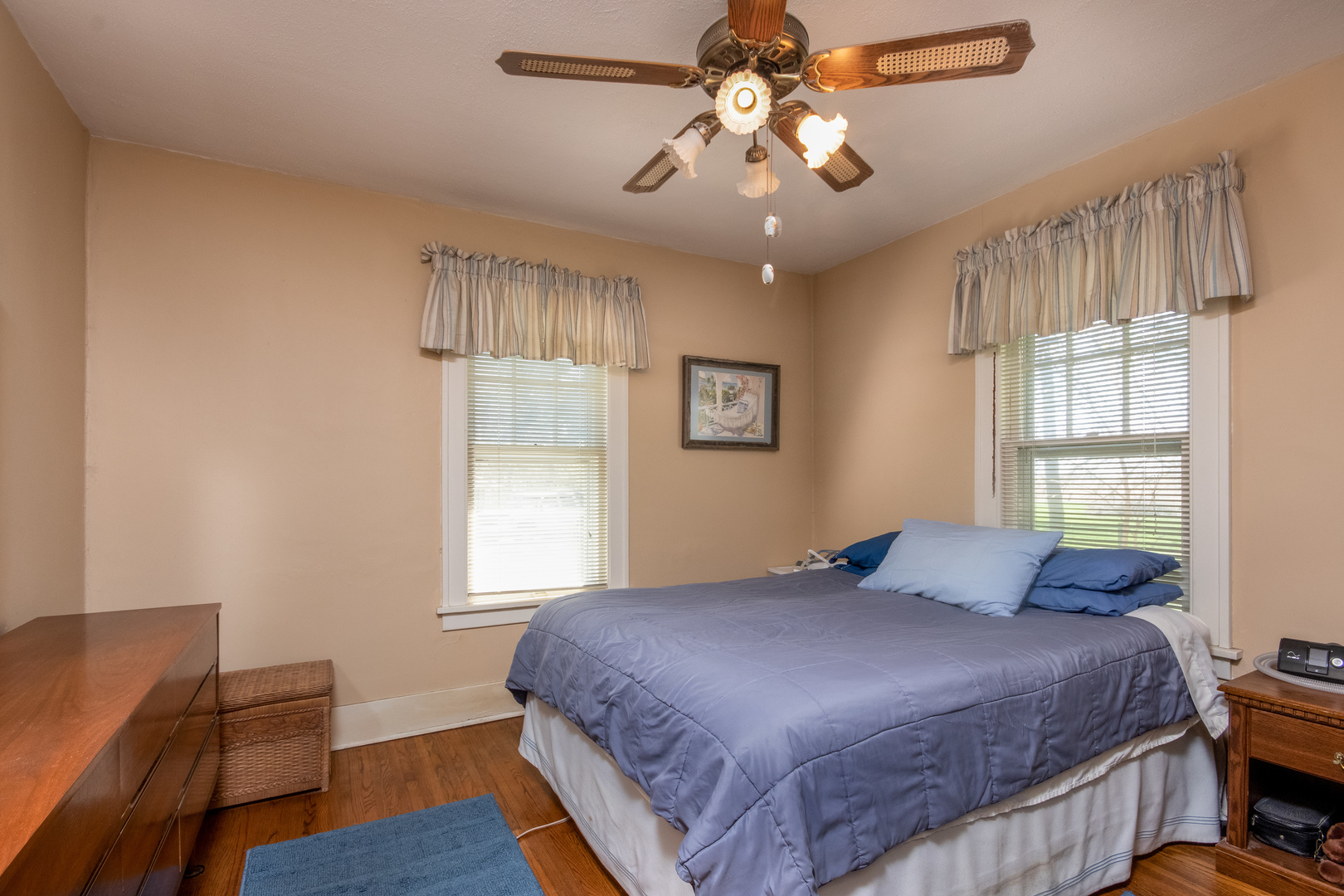 42W671 Jericho Road Sugar Grove, IL 60554 - Photo 25 of 31 a bedroom with a bed and wooden floor