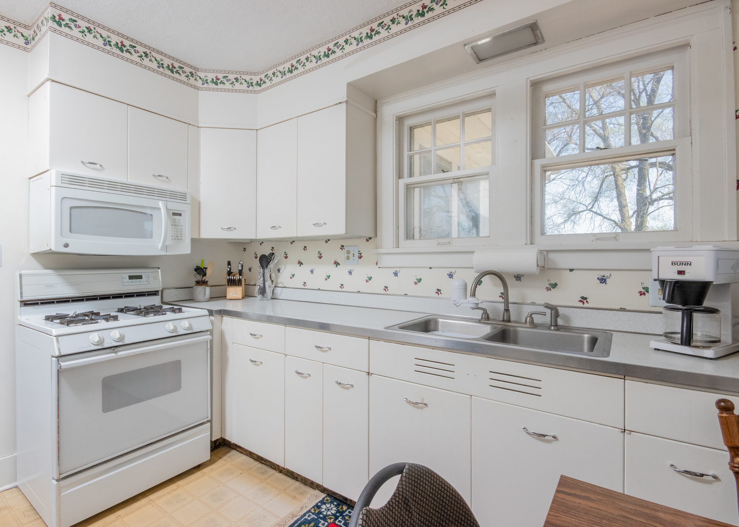 42W671 Jericho Road Sugar Grove, IL 60554 - Photo 28 of 31 a kitchen with granite countertop white cabinets and white appliances