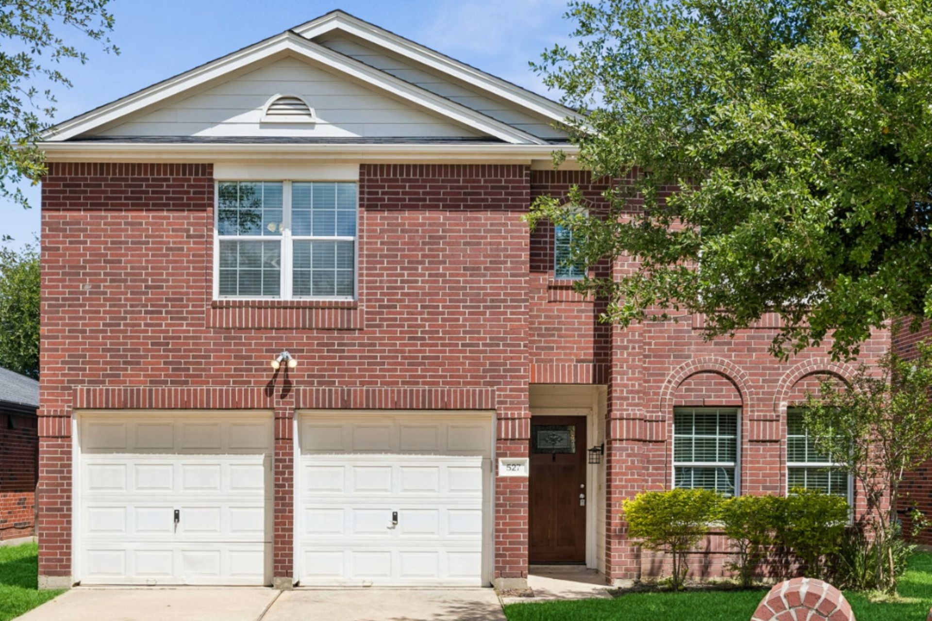 527 Cypresswood Knoll Spring, TX 77373 - Photo 1 of 15 a front view of a house with a yard