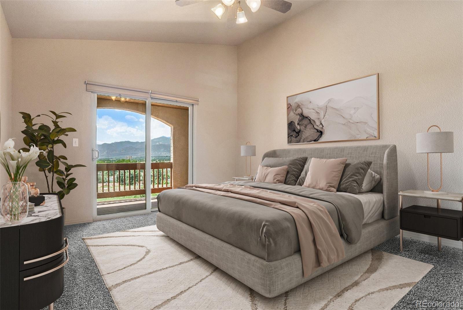 1131 Westmoreland Road Colorado Springs, CO 80907 - Photo 13 of 30 a bedroom with a large bed and a window