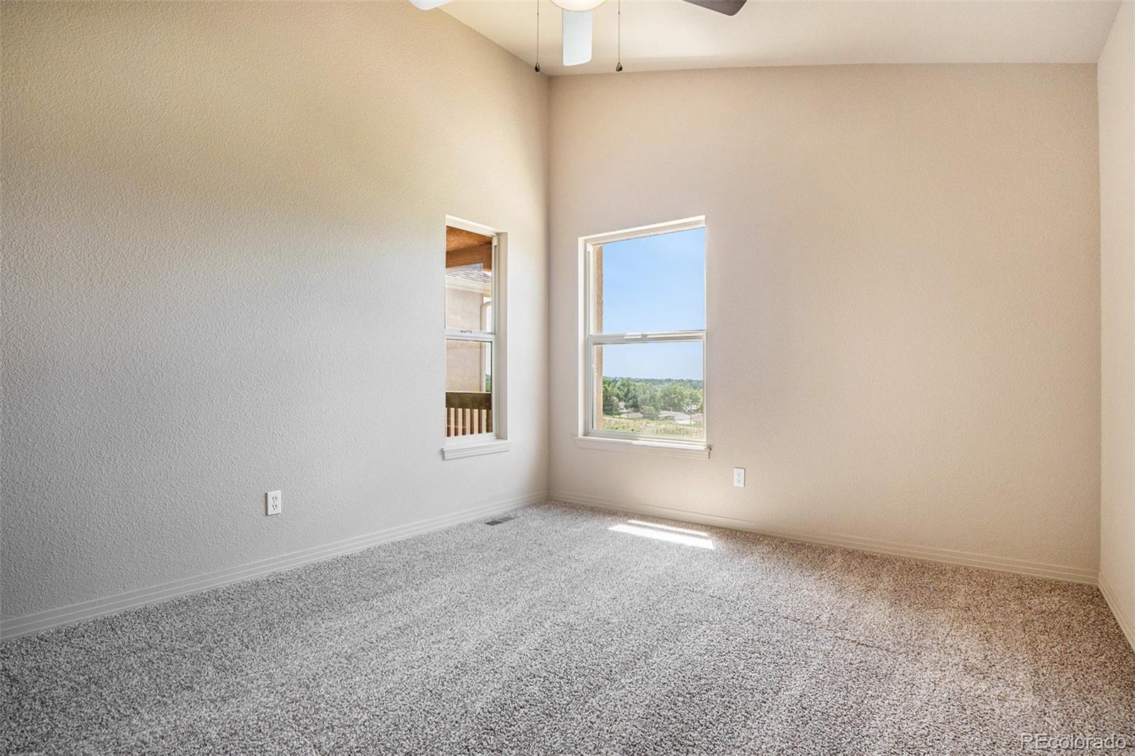 1131 Westmoreland Road Colorado Springs, CO 80907 - Photo 17 of 30 a view of an empty room with a window