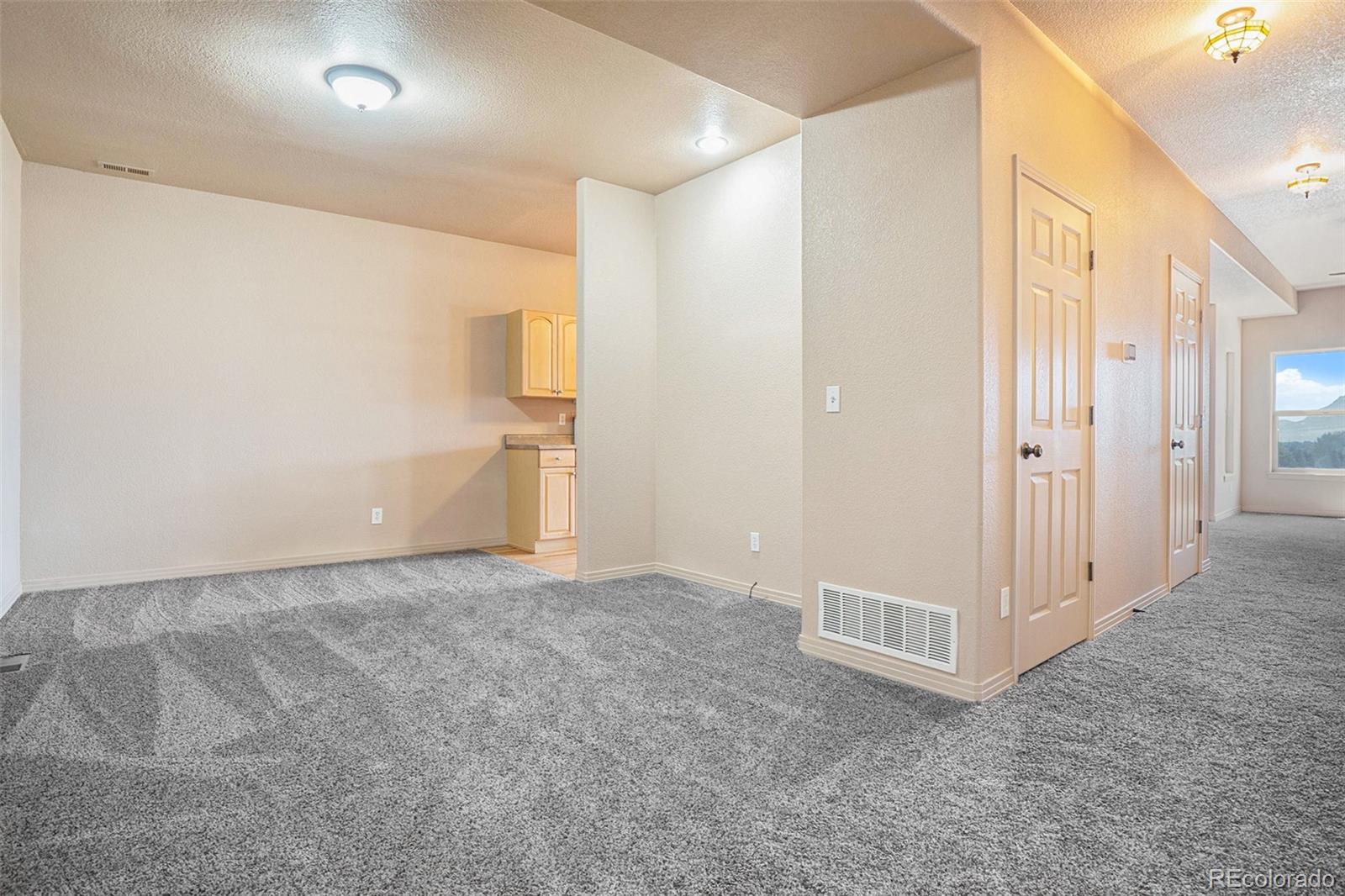 1131 Westmoreland Road Colorado Springs, CO 80907 - Photo 4 of 30 a view of an empty room