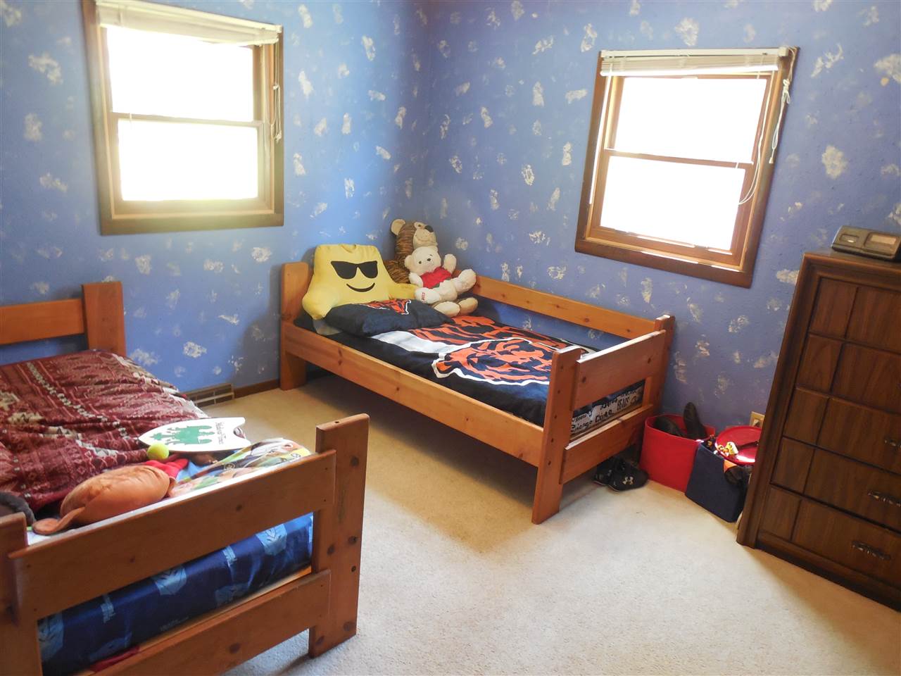 7084 Ralph Road Rockford, IL 61109 - Photo 12 of 21 a bed room with a bed and a window