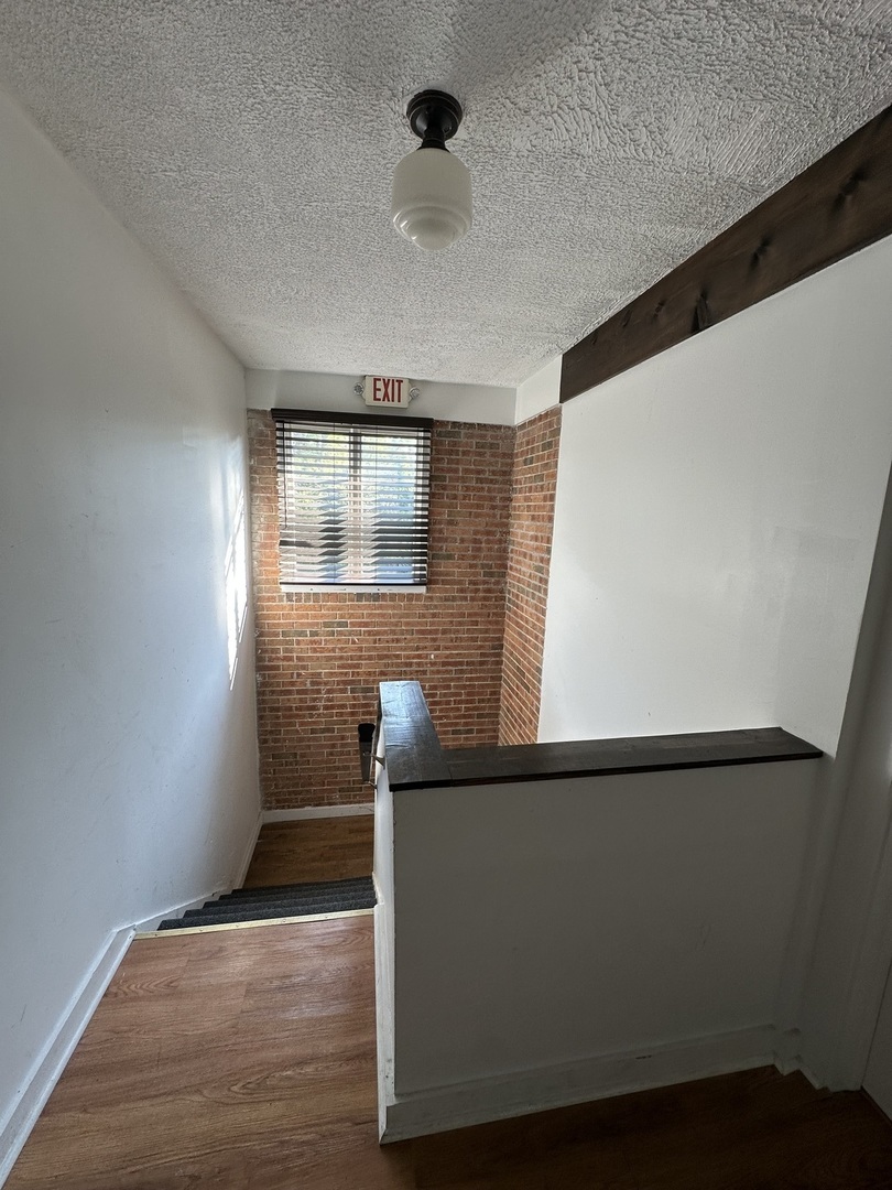 630 Green Bay Road Kenilworth, IL 60043 - Photo 6 of 21 a view of empty room with wooden floor