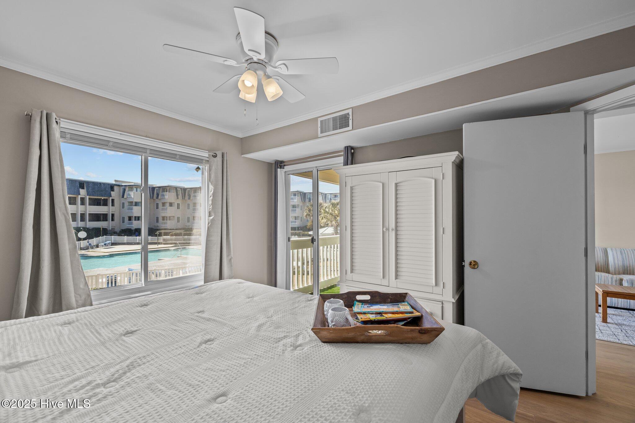 1904 East Fort Macon Road, Unit 180 Atlantic Beach, NC 28512 - Photo 19 of 38 Primary Suite Views Of Pool