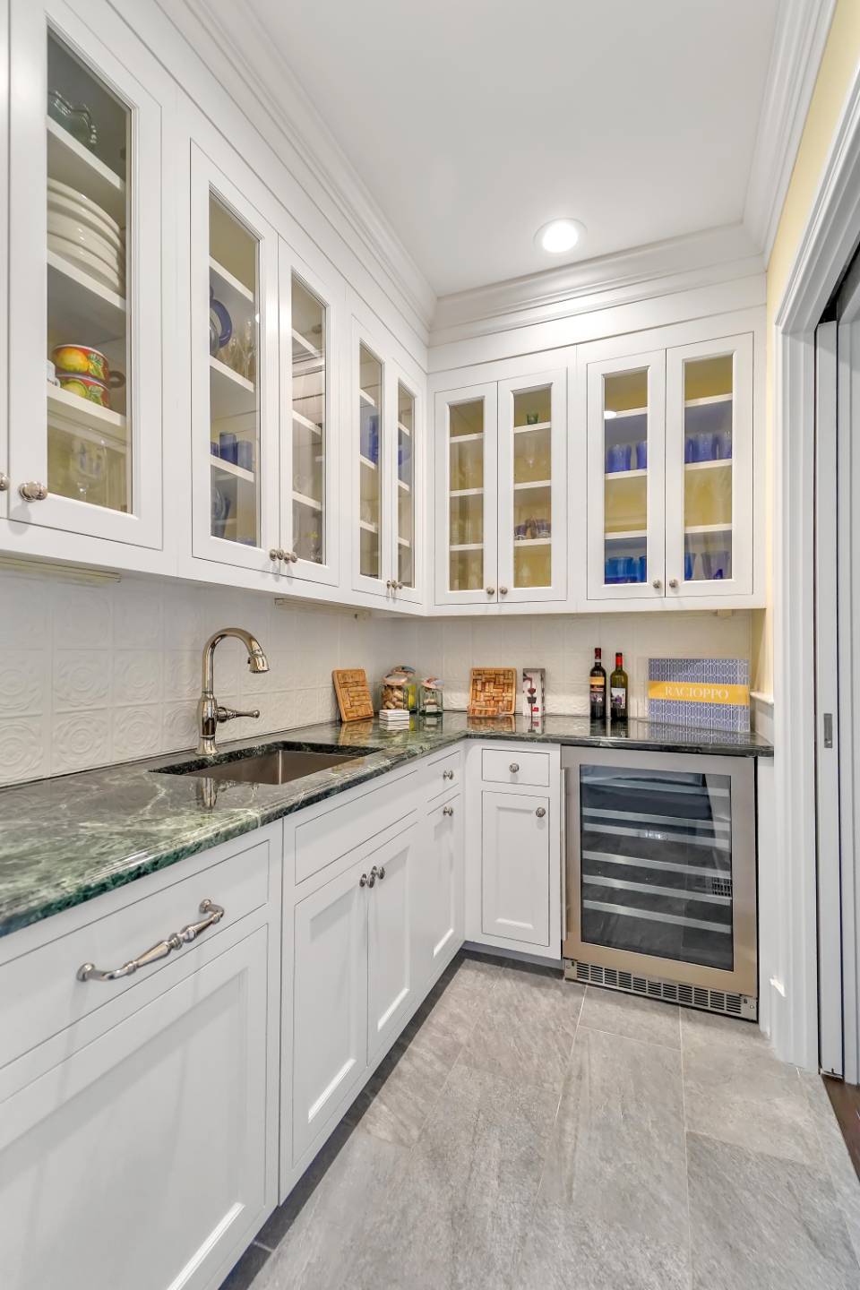 28 Bay Road Quogue, NY 11959 - Photo 12 of 35 a kitchen with granite countertop a sink and cabinets