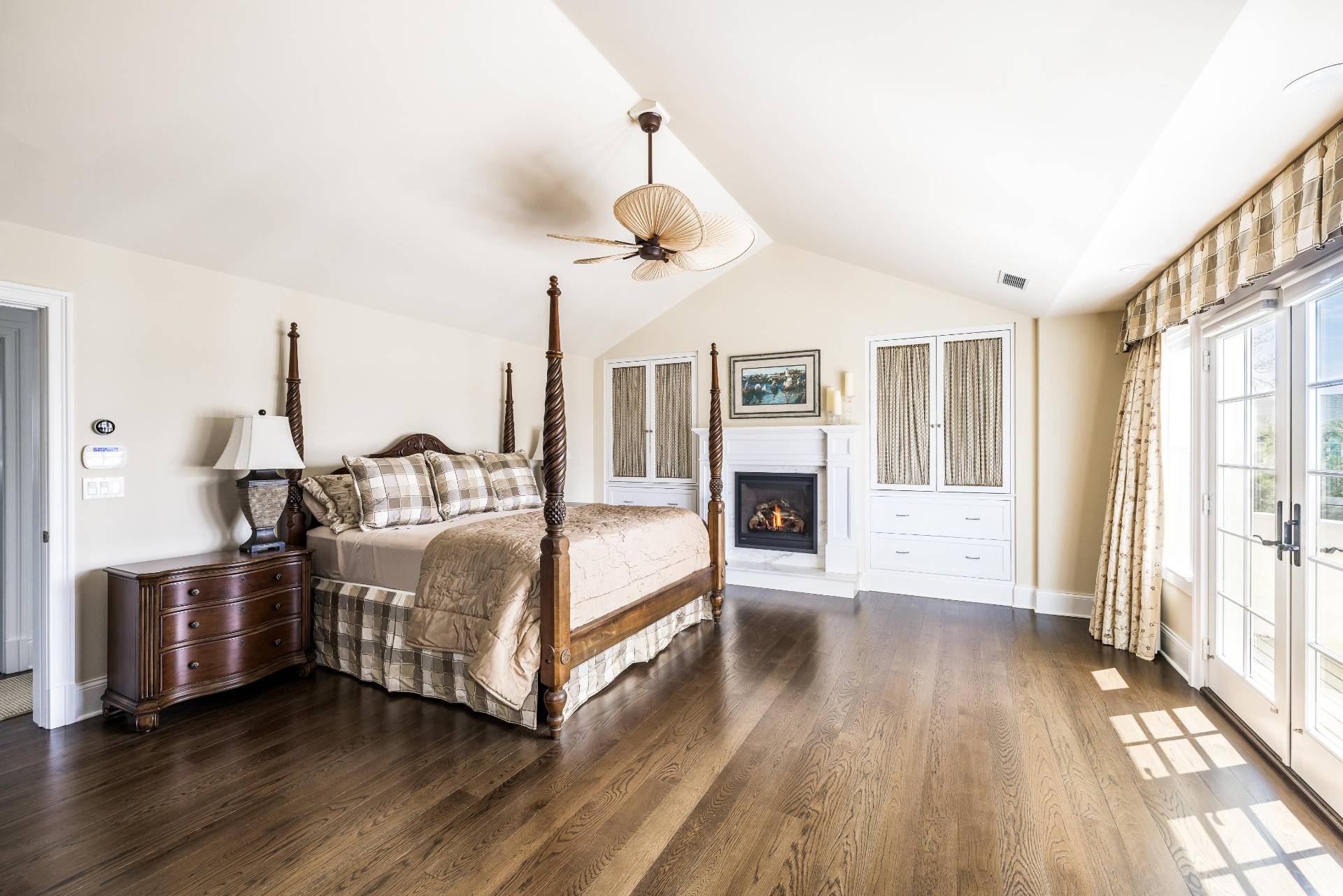 28 Bay Road Quogue, NY 11959 - Photo 17 of 35 a bedroom with furniture and wooden floor