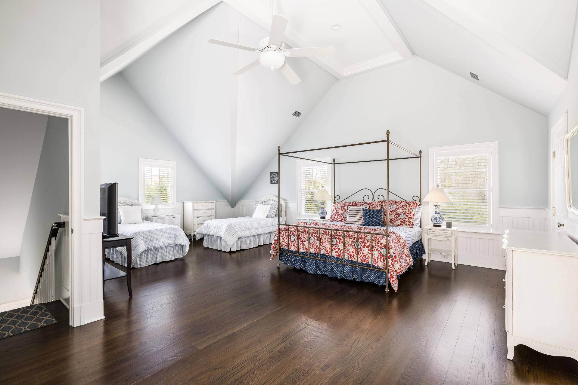 28 Bay Road Quogue, NY 11959 - Photo 26 of 35 a bed room with furniture and wooden floor
