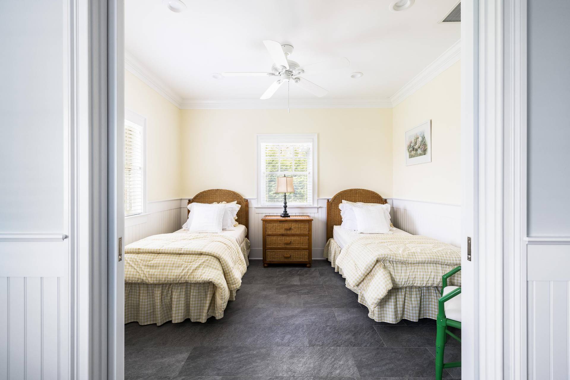 28 Bay Road Quogue, NY 11959 - Photo 28 of 35 a bedroom with two beds and painting on the wall