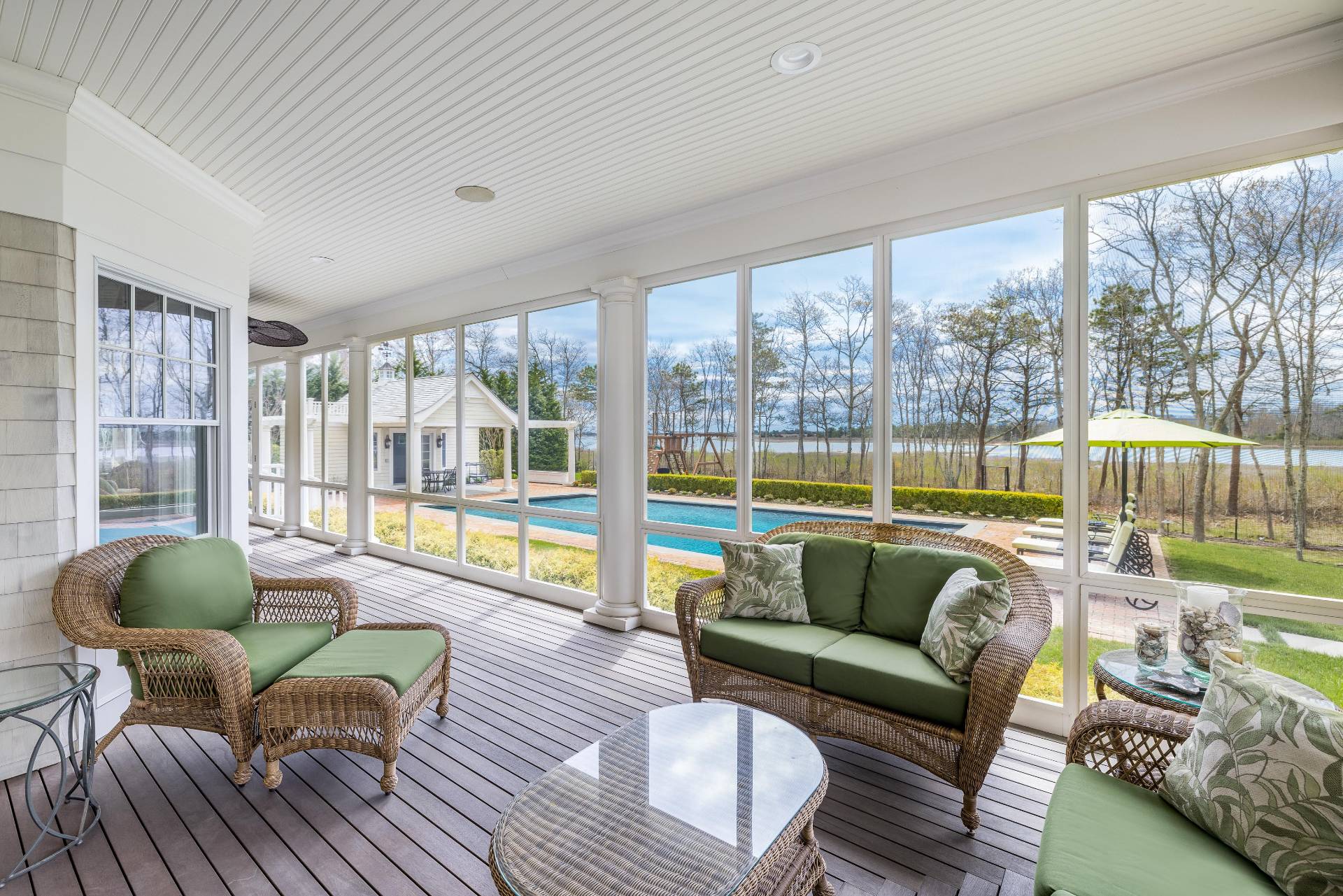 28 Bay Road Quogue, NY 11959 - Photo 30 of 35 a living room with furniture and a floor to ceiling window