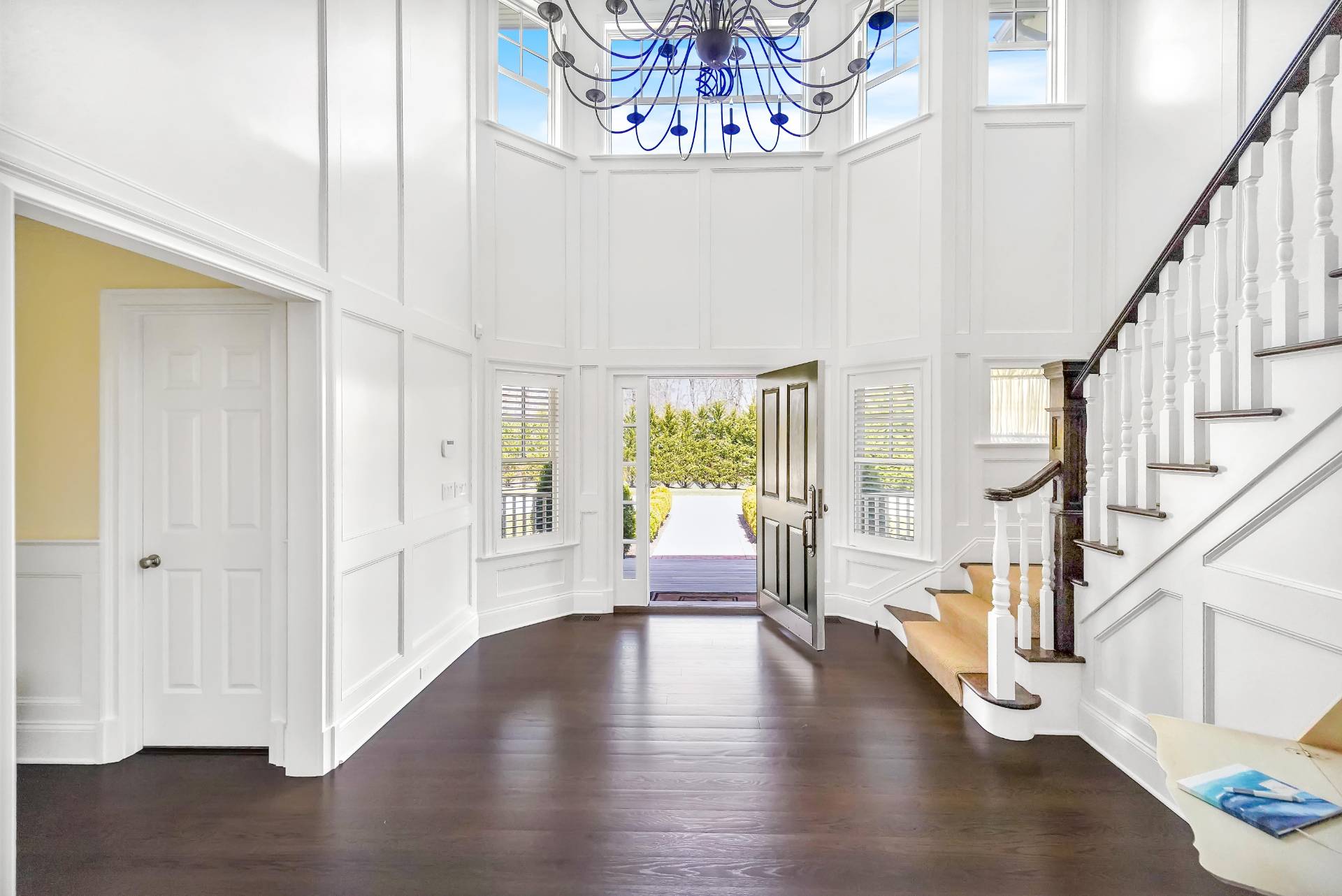 28 Bay Road Quogue, NY 11959 - Photo 8 of 35 a view of an entryway with wooden floor