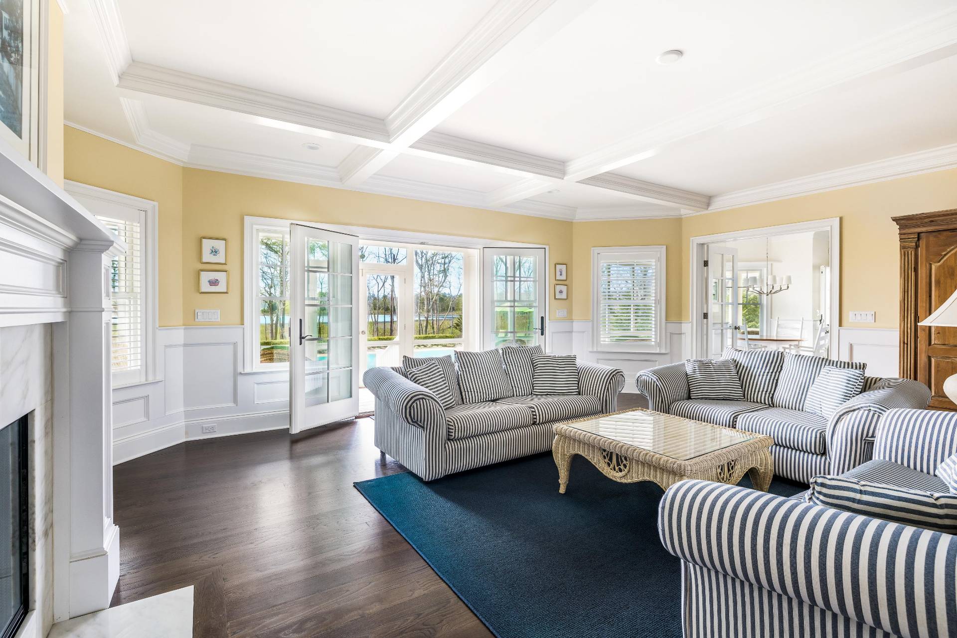 28 Bay Road Quogue, NY 11959 - Photo 9 of 35 a living room with furniture and a large window