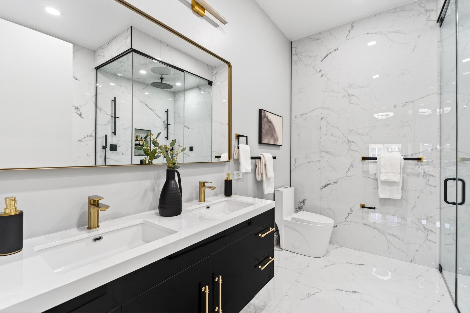 2024 West Irving Park Road, Unit 302 Chicago, IL 60618 - Photo 15 of 32 a bathroom with a double vanity sink mirror double shower and toilet