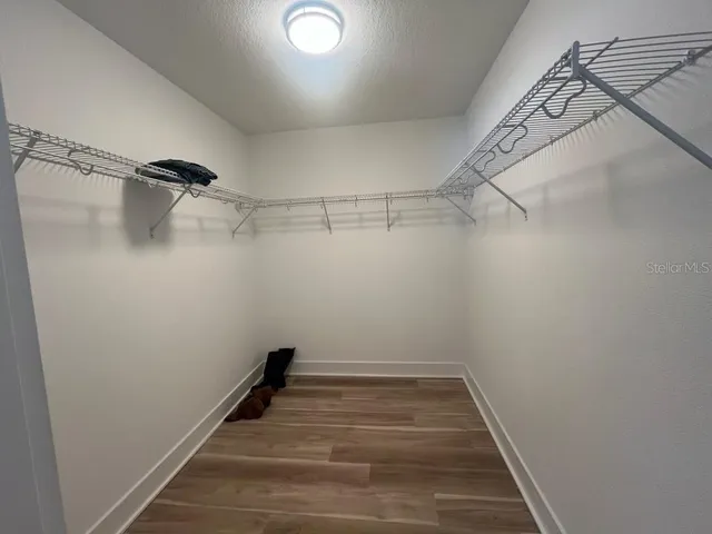 a view of a room with racks on the wall