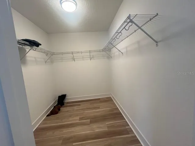 a view of a room with racks on the wall