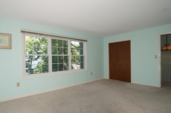 16 Neptune Road Marblehead, MA 01945 - Photo 18 of 22 a view of an empty room with a window