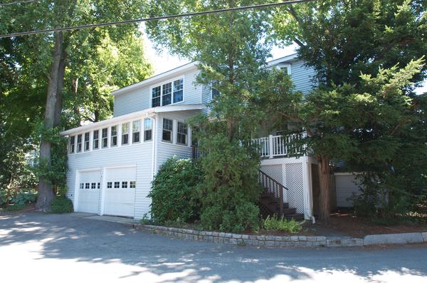 16 Neptune Road Marblehead, MA 01945 - Photo 2 of 22 a view of house with a yard and large trees
