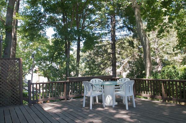 16 Neptune Road Marblehead, MA 01945 - Photo 21 of 22 a view of a deck with two chair and wooden floor