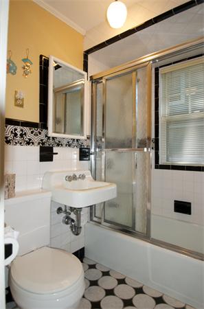 16 Neptune Road Marblehead, MA 01945 - Photo 10 of 22 a bathroom with a sink a toilet and shower