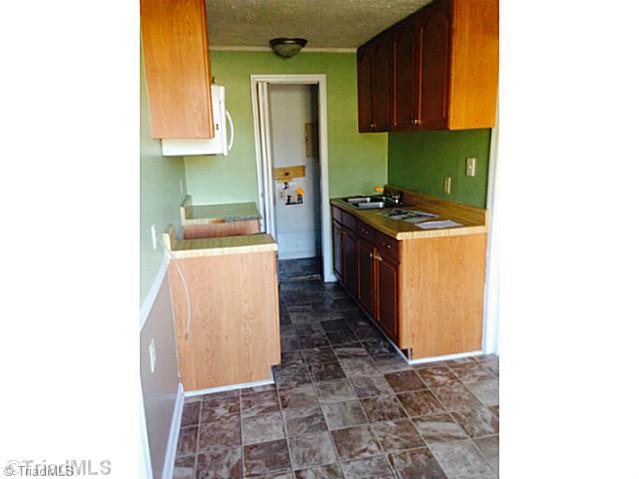 4719 Little Road Greensboro, NC 27405 - Photo 5 of 13 Kitchen.