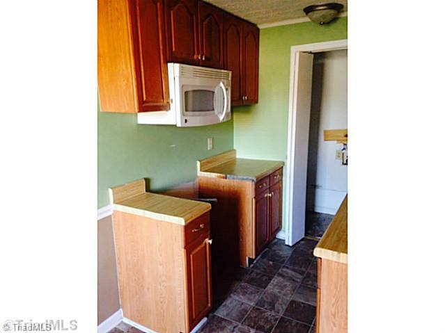 4719 Little Road Greensboro, NC 27405 - Photo 6 of 13 Kitchen.