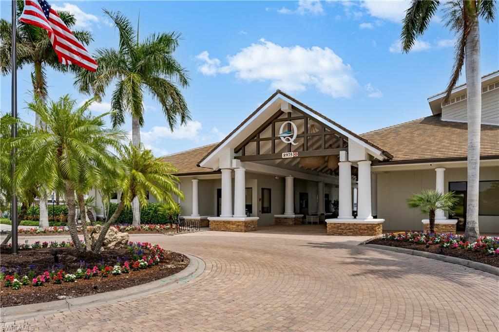 8754 Hideaway Harbor Court Naples, FL 34120 - Photo 33 of 49 front view of a house with a street