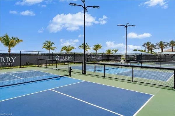 a view of a tennis court with tennis court