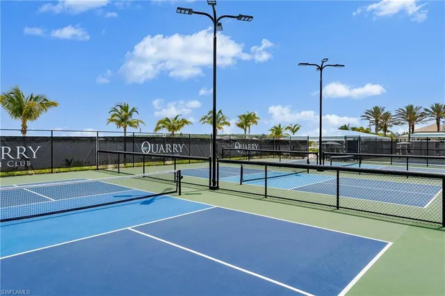 a view of a tennis court with tennis court