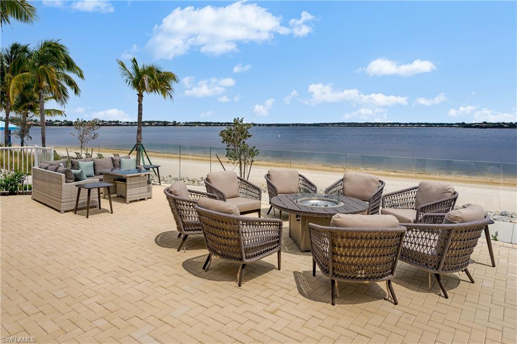 8754 Hideaway Harbor Court Naples, FL 34120 - Photo 43 of 49 a view of a terrace with furniture