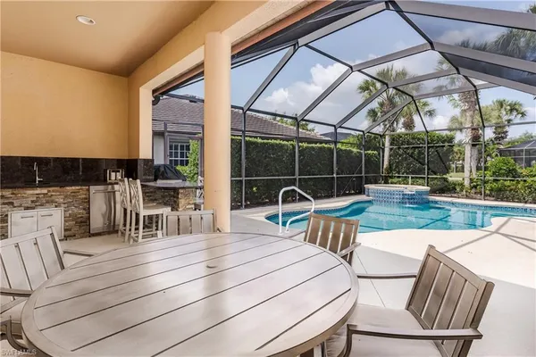 a view of a patio with couches chairs dining table and chairs