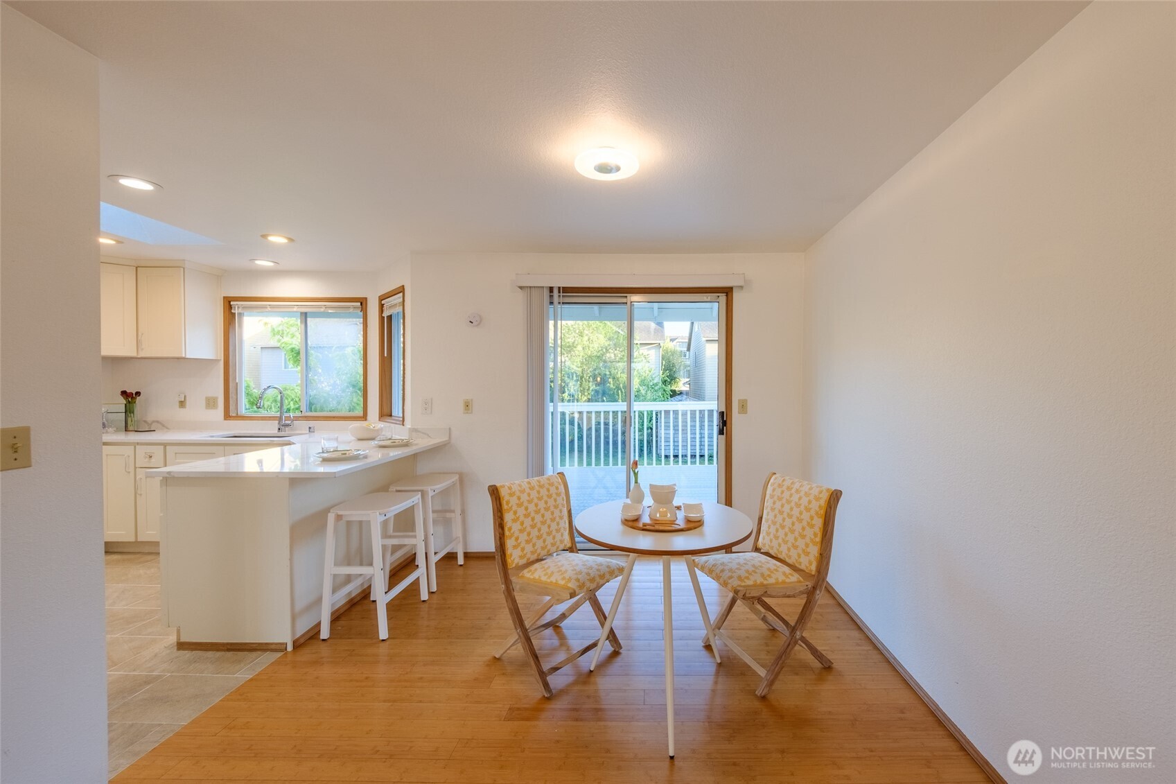 830 234th Street Southeast Bothell, WA 98021 - Photo 5 of 26 a view of a dining room with furniture and a window