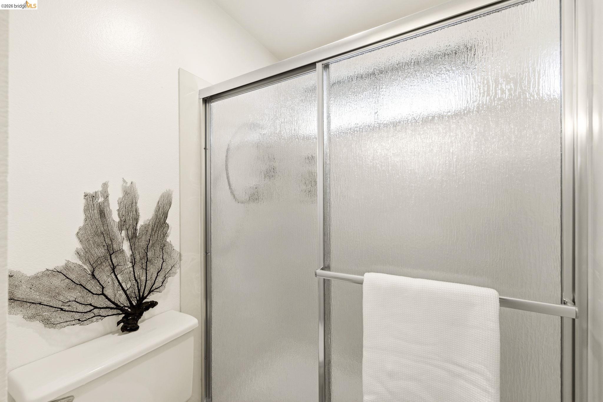 20111 West Ridge Court, Unit 13 Castro Valley, CA 94546 - Photo 25 of 50 Bathroom featuring toilet and a shower stall