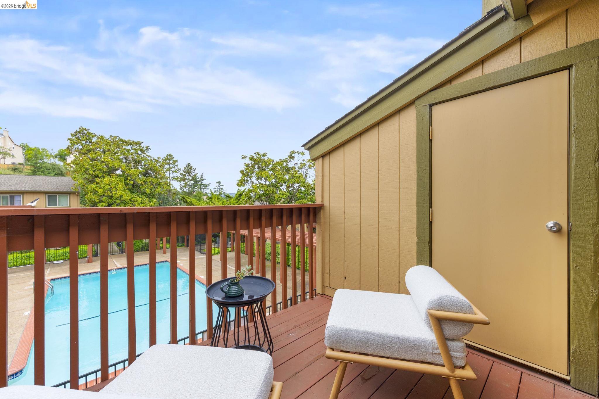 20111 West Ridge Court, Unit 13 Castro Valley, CA 94546 - Photo 34 of 50 Wooden deck featuring a community pool