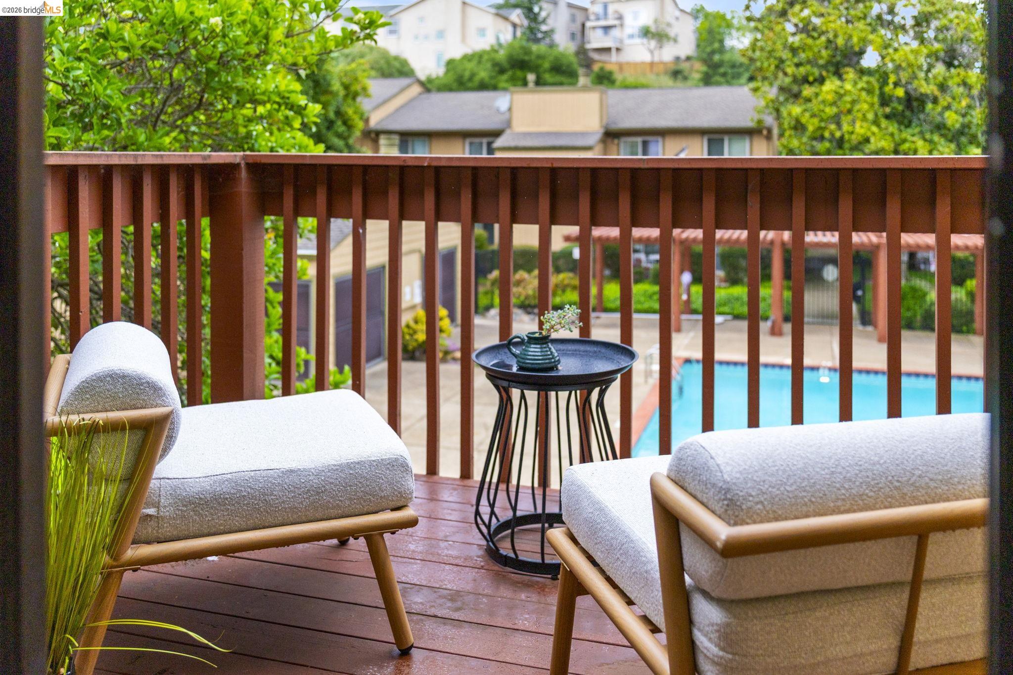20111 West Ridge Court, Unit 13 Castro Valley, CA 94546 - Photo 35 of 50 Wooden deck with a community pool