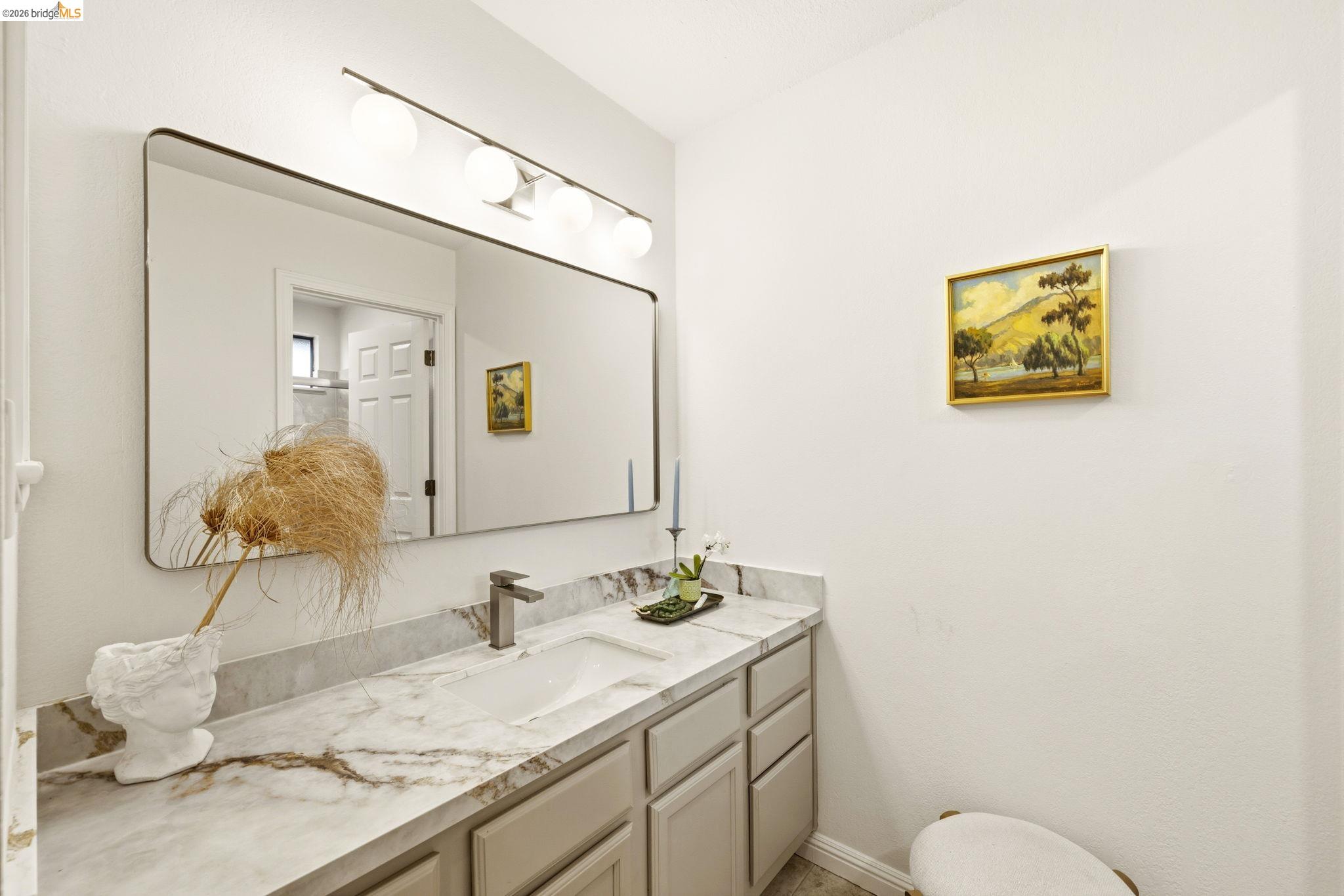 20111 West Ridge Court, Unit 13 Castro Valley, CA 94546 - Photo 37 of 50 Half bathroom featuring vanity and baseboards