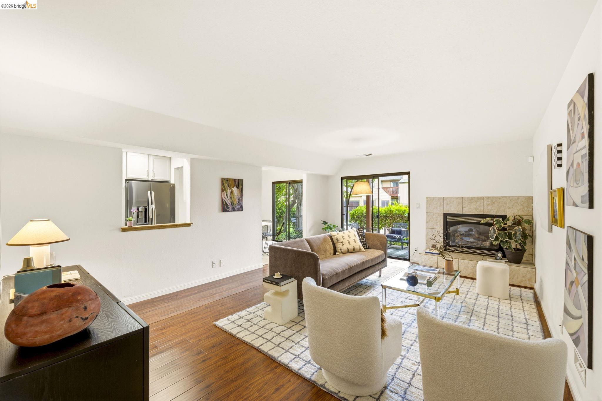 20111 West Ridge Court, Unit 13 Castro Valley, CA 94546 - Photo 5 of 50 Living area featuring a fireplace and hardwood / wood-style floors