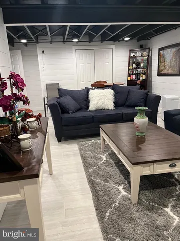 a living room with furniture and a couch